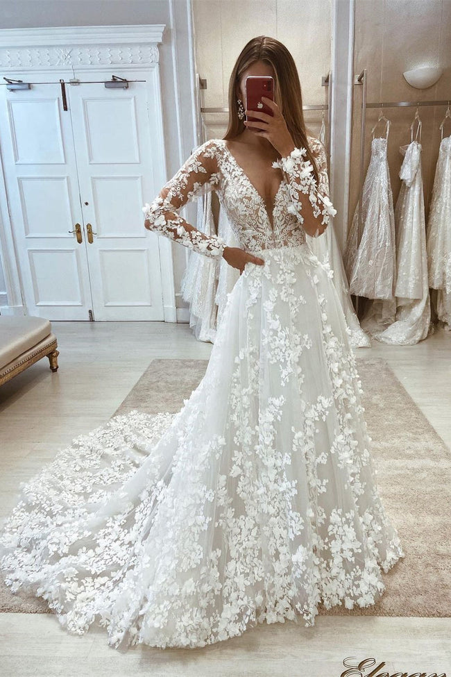 Chic V-neck A-line Lace Long Sleeves Floor Length Wedding dress Hover Image