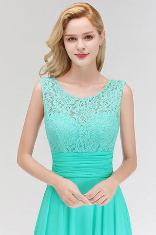 Vestido de dama de honor de gasa sin mangas con cuello redondo y encaje en la parte superior.