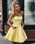 Cute Yellow A-line Strapless Satin Short Prom Homecoming Dresses with Pockets by BIZTUNNEL