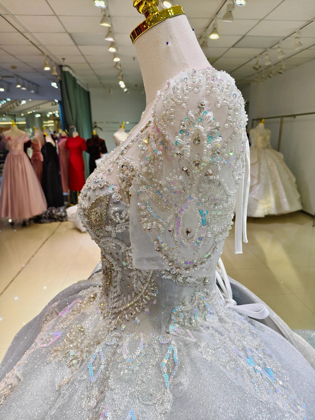 Silver Glimmer V-Neck Ballgown: Crystal-Embroidered Bust & Dramatic Bow Train by ZAPDRESS