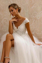 Designer A-Line Tulle Lace V-Neck Sleeveless White Wedding Dress With Appliques by misshow.com