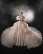 Opulent Off-the-Shoulder Ball Gown Tulle Puff Sleeve Beaded Lace Wedding Dress with Layered Ruffled Train & Choker Q6001 by ZAPDRESS