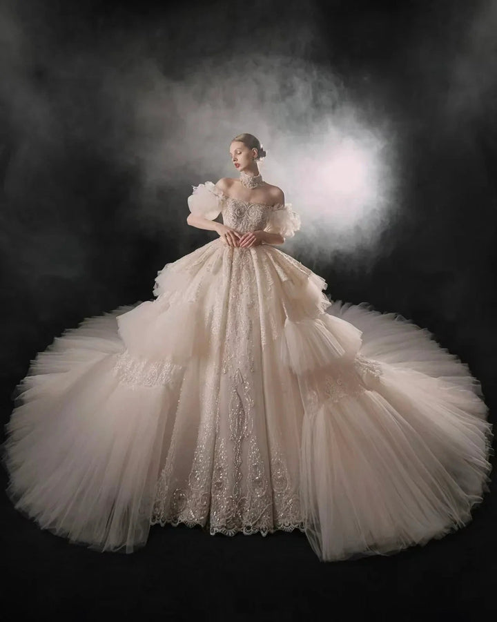 Opulent Off-the-Shoulder Ball Gown Tulle Puff Sleeve Beaded Lace Wedding Dress with Layered Ruffled Train &amp; Choker Q6001 by ZAPDRESS