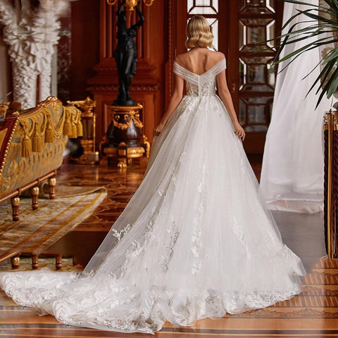 Vestido de novia romántico y sexy con escote en V 2023, corte A, largo hasta el suelo, encantador, hombros descubiertos, apliques de cuentas. 