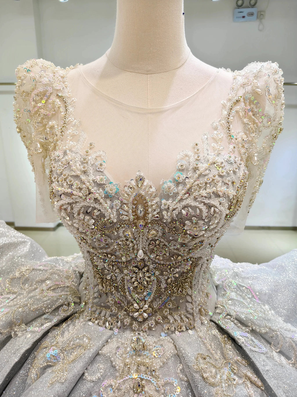 Silver Glimmer V-Neck Ballgown: Crystal-Embroidered Bust & Dramatic Bow Train by ZAPDRESS