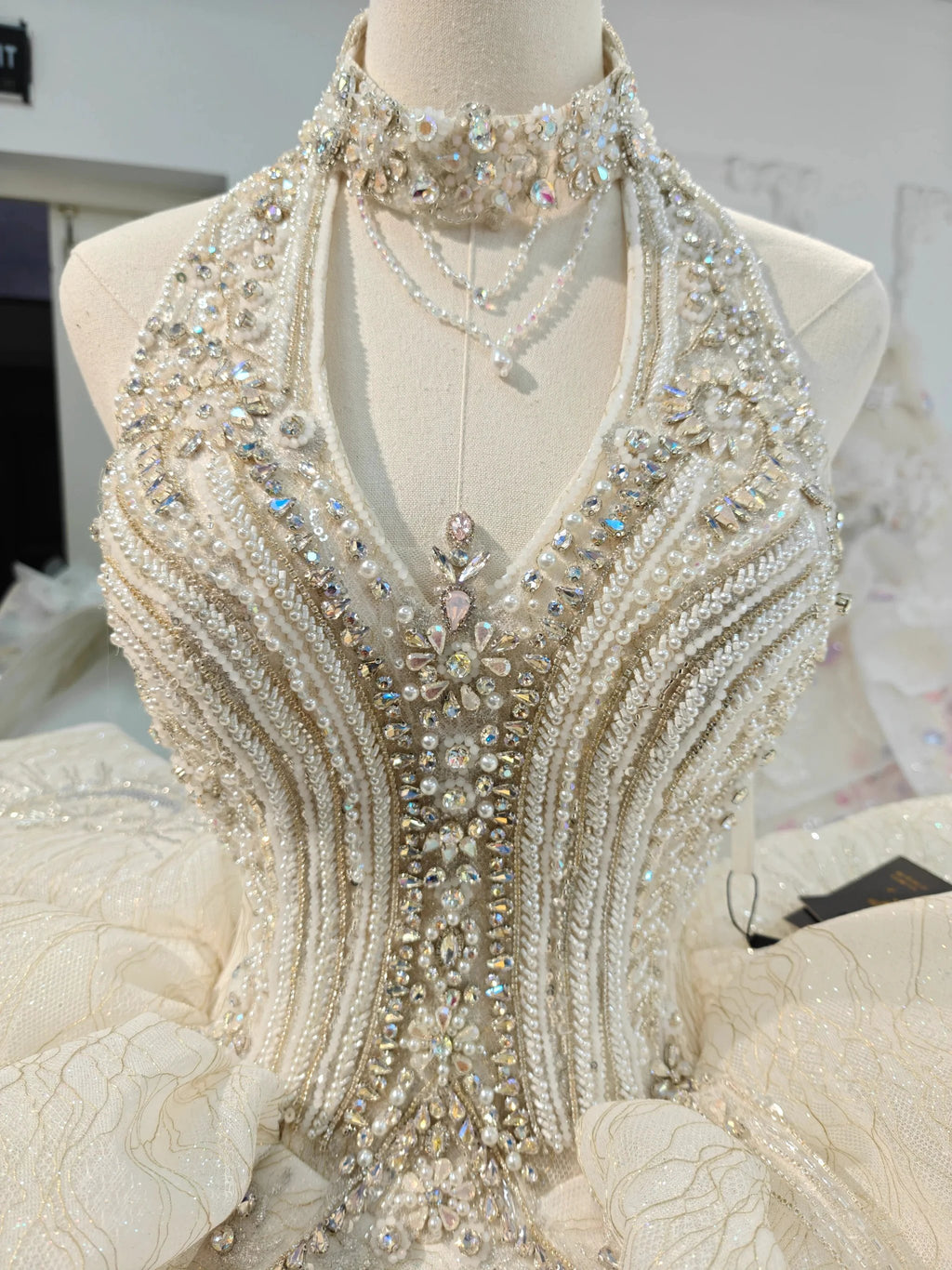 Lavish Halter-Neck Ball Gown Wedding Dress with Pearl Crystal Embroidery & Ruffled Tulle Skirt Ye-2034 by ZAPDRESS