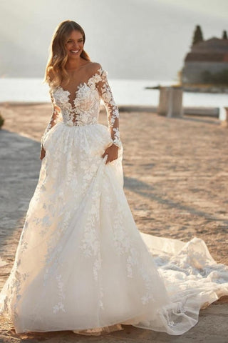 Elegantes vestidos de novia de corte A con apliques de encaje y mangas