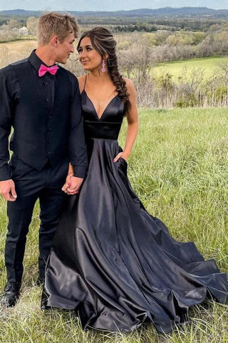 Elegante vestido de fiesta largo negro de corte A con escote en V y bolsillos