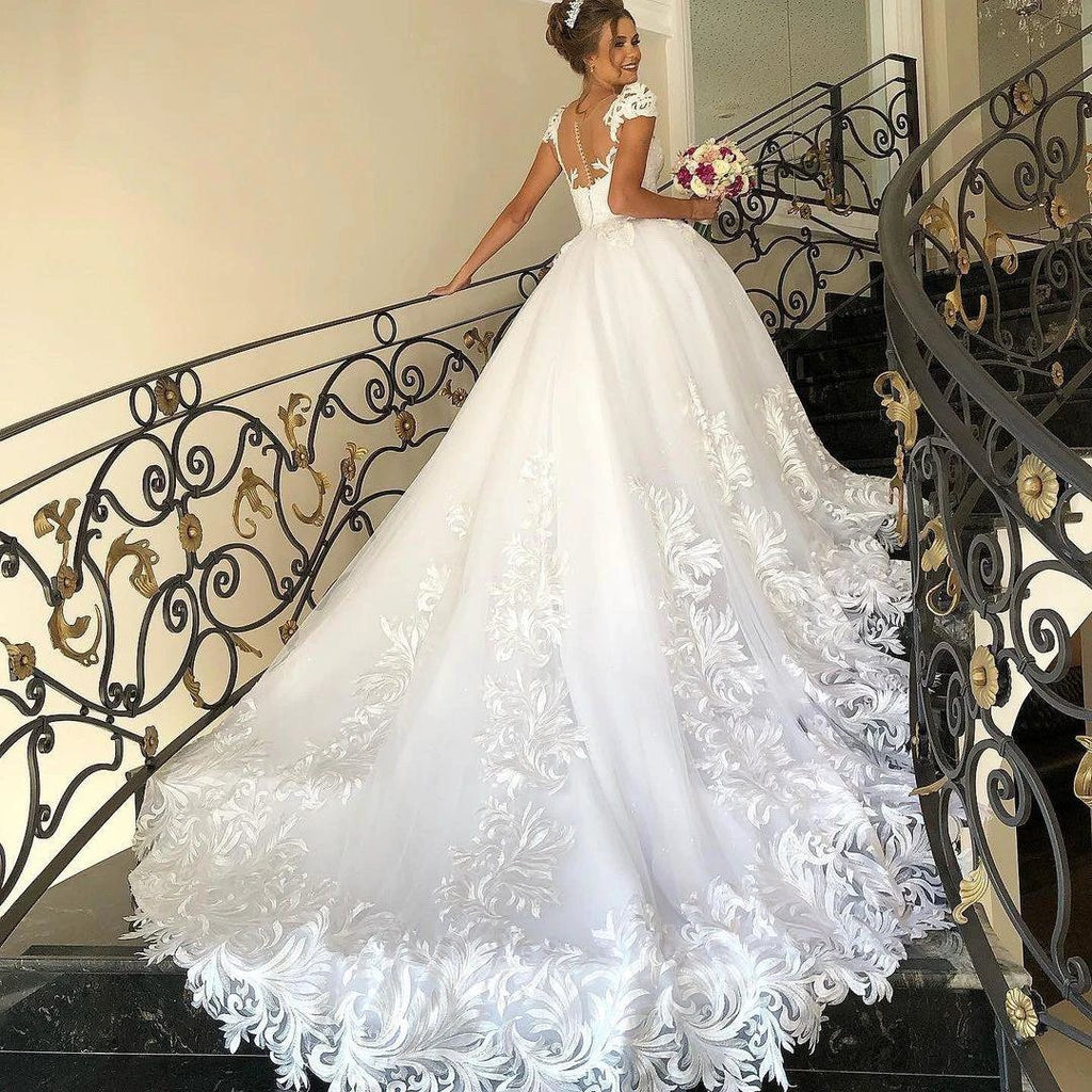 Elegant Long Princess Tulle Lace Wedding Dress with Cap Sleeves by BIZTUNNEL
