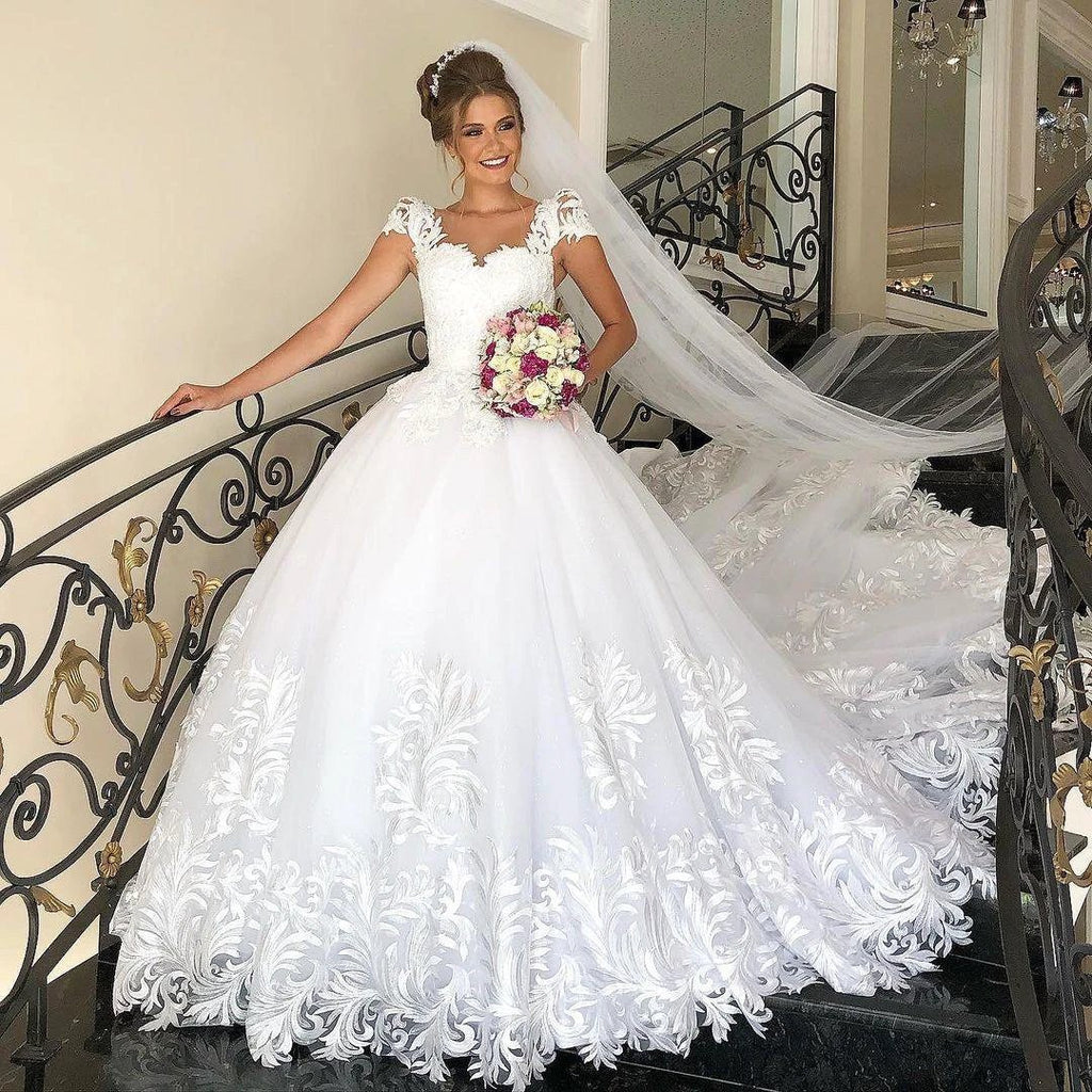 Elegant Long Princess Tulle Lace Wedding Dress with Cap Sleeves by BIZTUNNEL