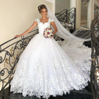 Elegant Long Princess Tulle Lace Wedding Dress with Cap Sleeves by BIZTUNNEL