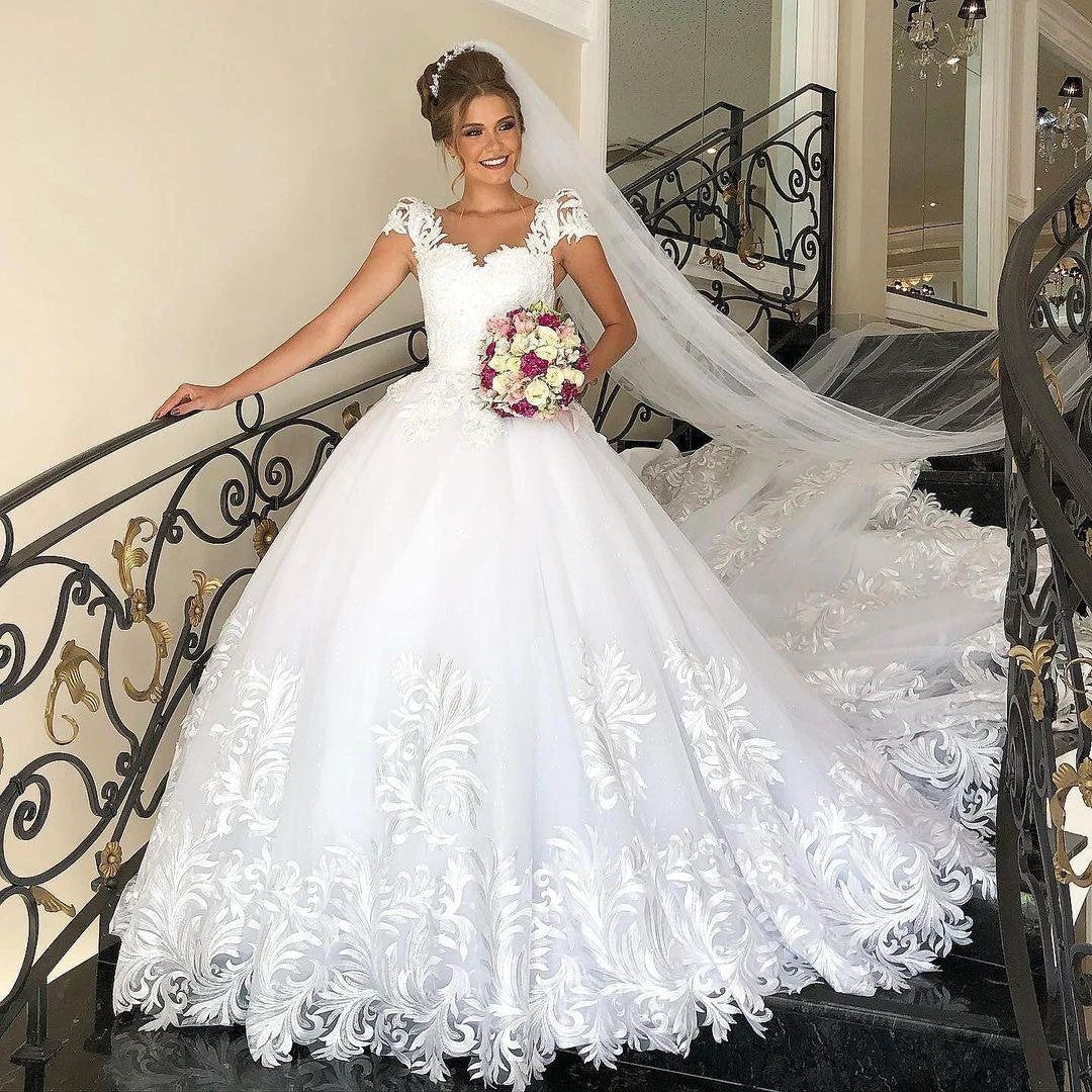 Elegant Long Princess Tulle Lace Wedding Dress with Cap Sleeves by BIZTUNNEL