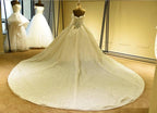 Elegant Long Sleeve Sweetheart Lace-up Ivory Tulle Ball Gown Wedding Dress by misshow.com
