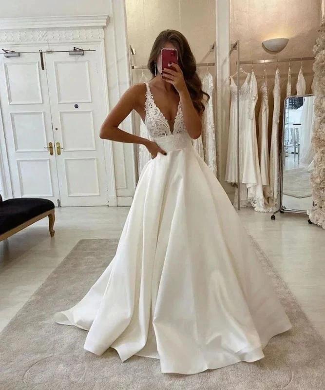 Elegant Sleeveless Tulle Backless A-Line Wedding Dresses With Lace by misshow.com
