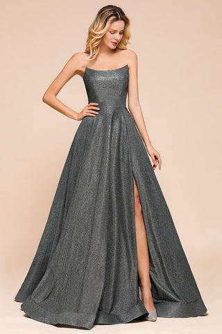 Vestido de fiesta largo con abertura y espalda descubierta sin tirantes y con purpurina