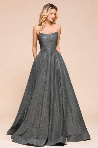 Vestido de fiesta largo con abertura y espalda descubierta sin tirantes y con purpurina