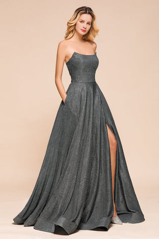 Vestido de fiesta largo con abertura y espalda descubierta sin tirantes y con purpurina