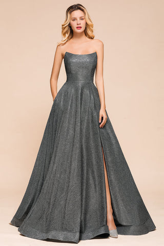 Vestido de fiesta largo con abertura y espalda descubierta sin tirantes y con purpurina