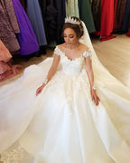 Gorgeous Long A-line Off-the-shoulder Wedding Dresses with Sleeves by BIZTUNNEL