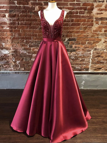 Hermosos vestidos de graduación de satén con escote en V y corte A largos con cuentas