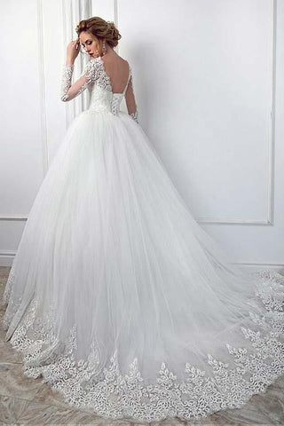 Hermoso vestido de novia largo de tul con encaje y mangas