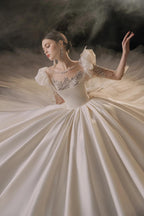 Regal Ball Gown Illusion Neckline Tulle Puff Sleeve Beaded Lace Wedding Dress with Oversized Bow Train E-304 (ZD16888)