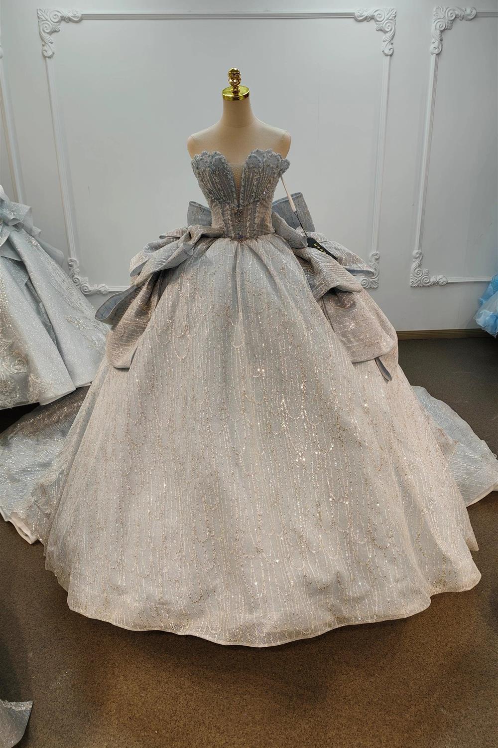 Robe de mariée bleu clair rêveuse à corsage en cœur, jupon bouffant avec tulle à paillettes, perles et grand nœud Ye-2029