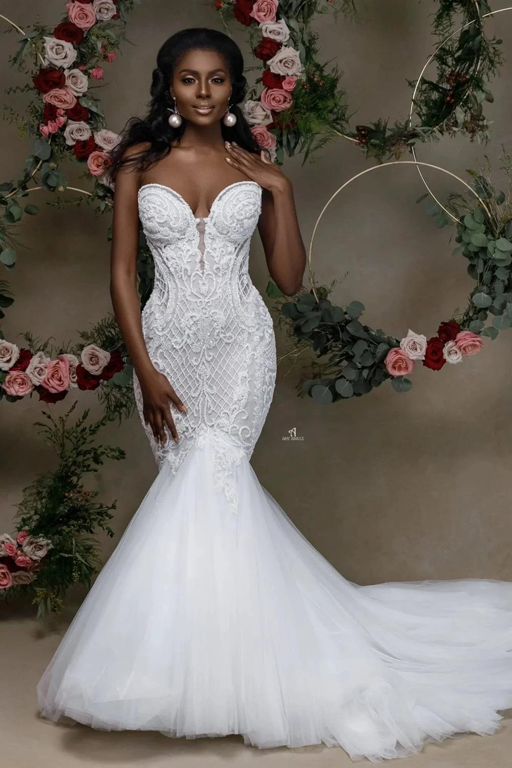 Belle robe de mariée sirène en dentelle à corsage cœur sans bretelles avec appliqué