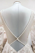 Robes de mariée ivoire en tulle, coupe trapèze, manches longues, appliques en dentelle, dos ouvert