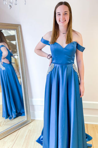 Vestido de fiesta largo de corte A con hombros descubiertos, bolsillos y adornos de cristal