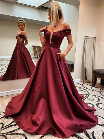 Vestidos de fiesta formales de satén con hombros descubiertos, corte A largo y bolsillos