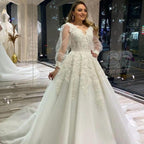 Long A-Line V-neck Appliques Lace Tulle Wedding Dress With Puffy Long Sleeves by BIZTUNNEL