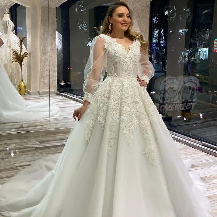 Long A-Line V-neck Appliques Lace Tulle Wedding Dress With Puffy Long Sleeves by BIZTUNNEL