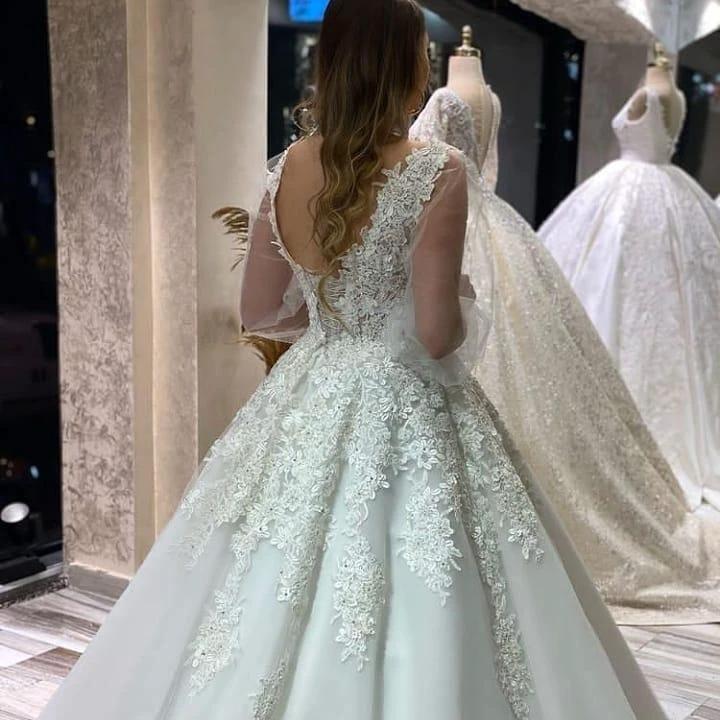 Long A-Line V-neck Appliques Lace Tulle Wedding Dress With Puffy Long Sleeves by BIZTUNNEL