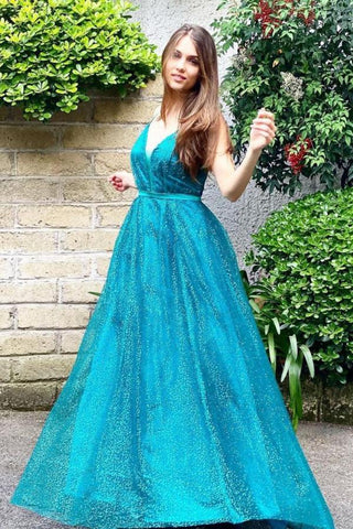 Vestido de fiesta largo con escote en V, lentejuelas y espalda abierta