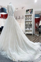Long A-line V-neck Spaghetti Straps Tulle Lace Backless Wedding Dress by BIZTUNNEL