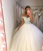 Long Princess off-the-shoulder Tulle Wedding Dress by BIZTUNNEL