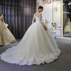 Long Sleeve A-Line Bateau Appliques Lace Sequins Wedding Dress by BIZTUNNEL
