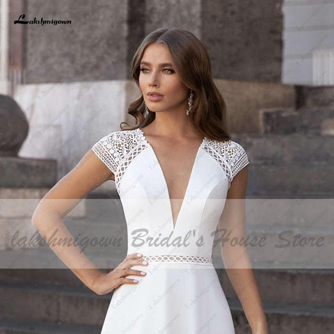 Abiti Donna Modest Bridal A-Linie Brautkleid Sommer 2025 Schlichtes V-Ausschnitt Rückenfreies Strandbrautkleid Lange Schleppe