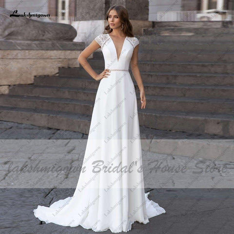 Abiti Donna Modest Bridal A-Linie Brautkleid Sommer 2025 Schlichtes V-Ausschnitt Rückenfreies Strandbrautkleid Lange Schleppe