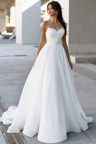 Glamorosos vestidos de novia modestos de satén con escote en A y perlas MW1024