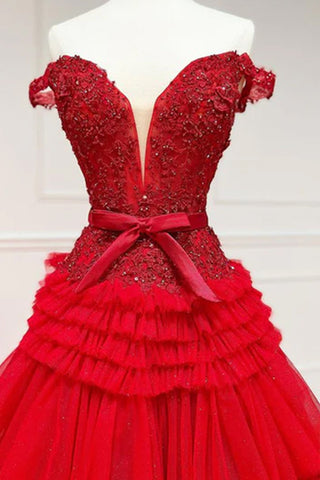 Vestido de fiesta largo rosa de tul con volantes y hombros descubiertos con lazo