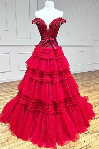 Vestido de fiesta largo rosa de tul con volantes y hombros descubiertos con lazo