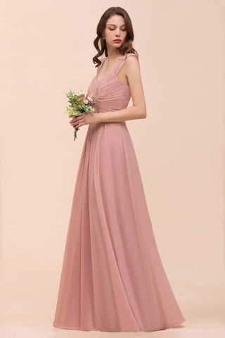 Vestido maxi rosa empolvado de dama de honor con tirantes y volantes en forma de A para niñas