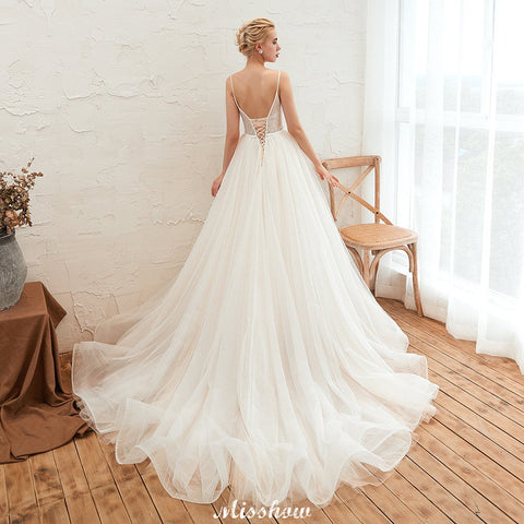 Spaghetti Straps Plunging V-Neck Wedding Dress Low Back Champagne Bridal Gown