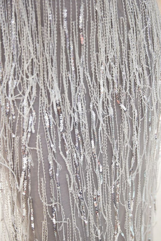 Vestido de fiesta de sirena con borlas y escote en V brillante y lentejuelas