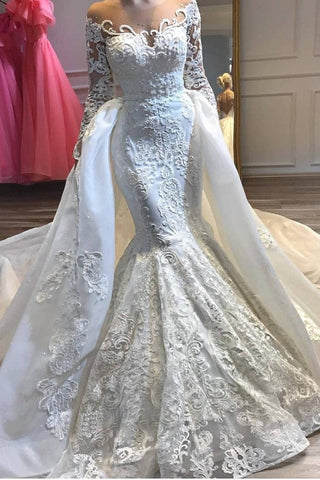 Impresionante vestido de novia de sirena con cuello redondo y cola desmontable.