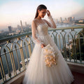 Elegant White Long Sheer Sleeve A-Line Tulle Wedding Dress with Lace Appliqués SW713