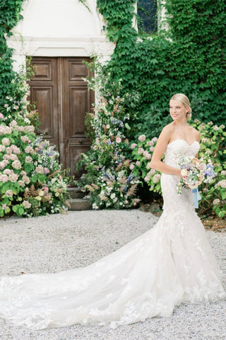 Vestido de novia de sirena sin mangas con apliques de tul y encaje