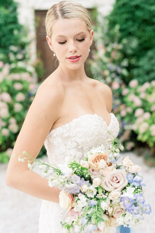 Vestido de novia de sirena sin mangas con apliques de tul y encaje